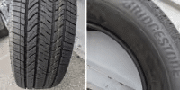 Close-up of a Bridgestone tire showcasing its tread pattern and sidewall details, highlighting durability and performance features for optimal traction on various road conditions.