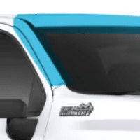 Chevrolet truck front grille featuring a distinctive turquoise accent, highlighting the modern design elements and branding of the vehicle.