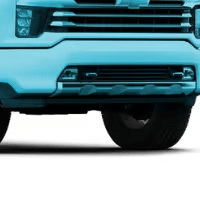 Chevrolet truck front grille featuring a distinctive turquoise accent, highlighting the modern design elements and branding of the vehicle.