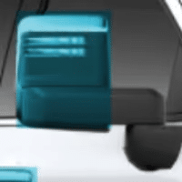 Chevrolet truck front grille featuring a distinctive turquoise accent, highlighting the modern design elements and branding of the vehicle.